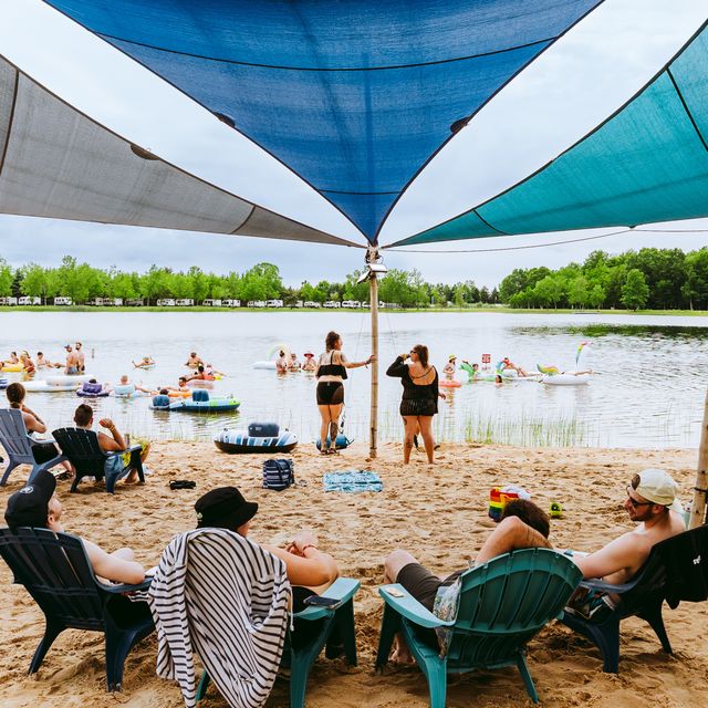 attendees swimming at the lake