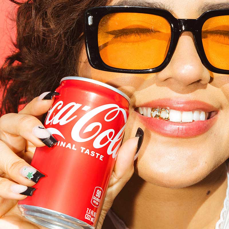 closeup of fan with can of Coke