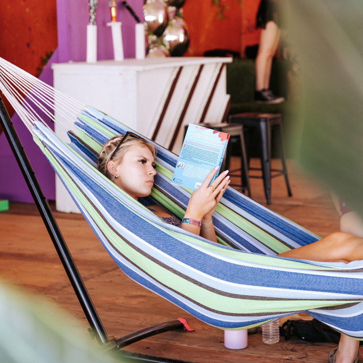 Fan reading in hammock