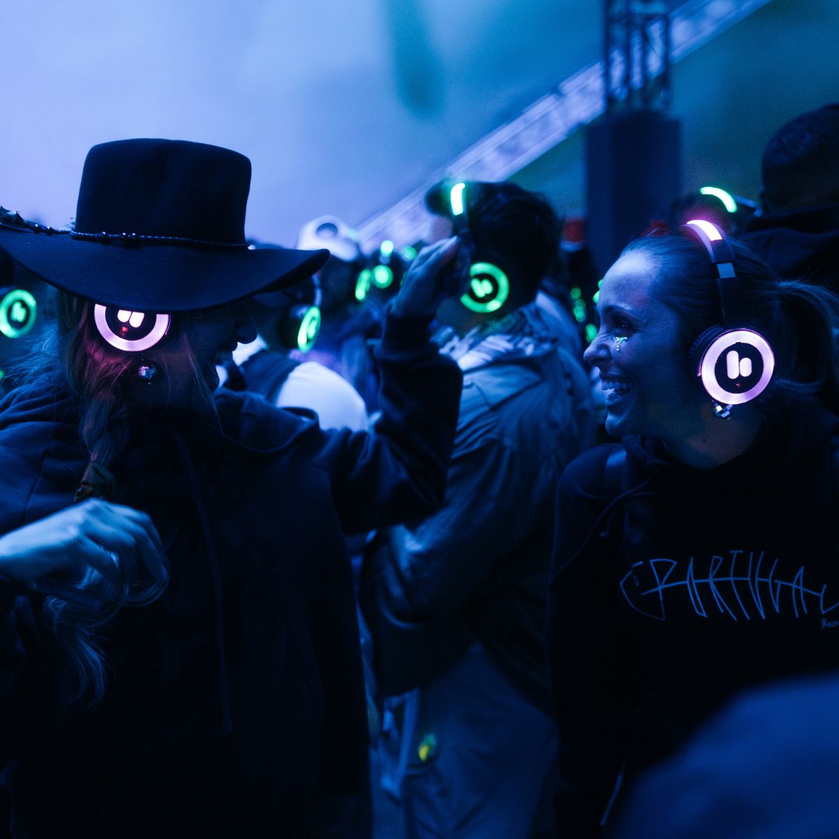 Fans hanging out in dance lounge at desert sky