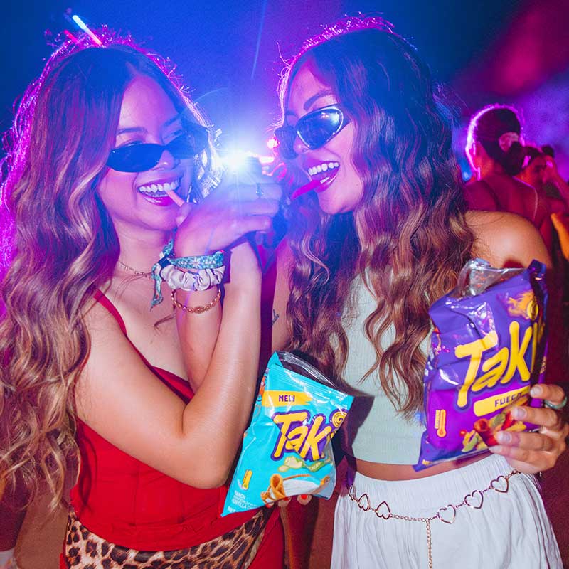 Fans enjoying Takis