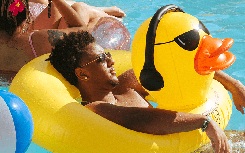 man laying in floatie