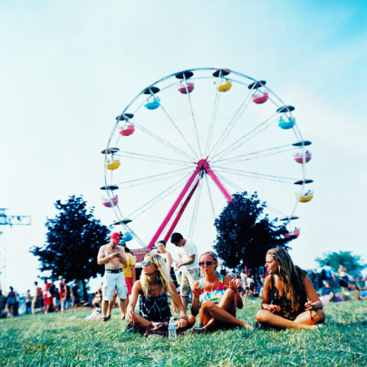 sitting in front of ferris wheel