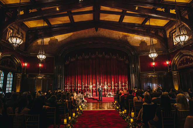 Man Giving Speech on Stage