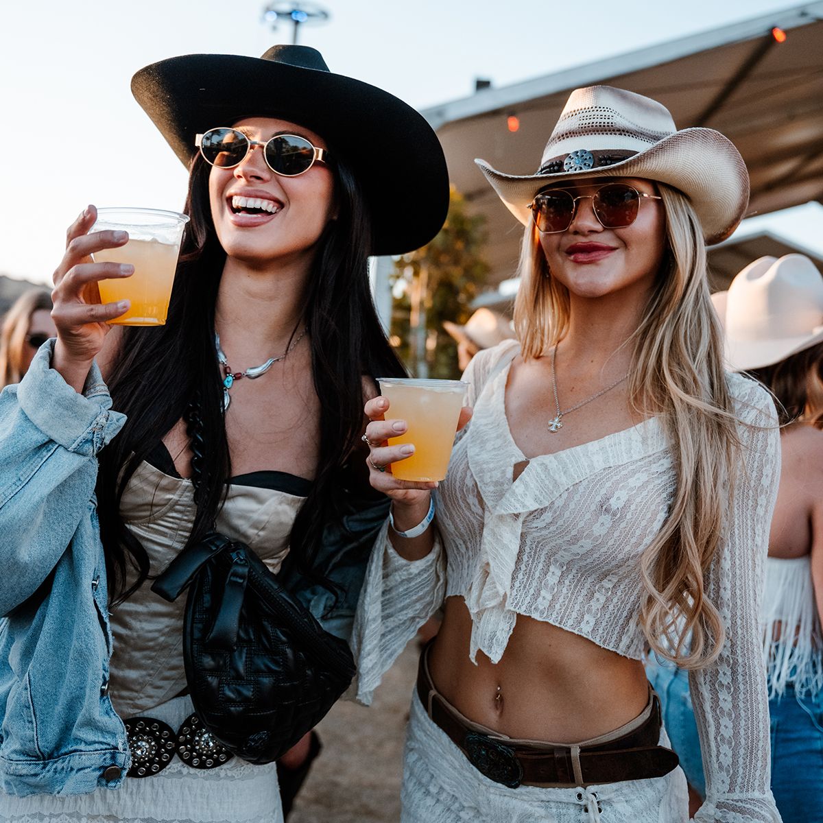 attendees holding beers