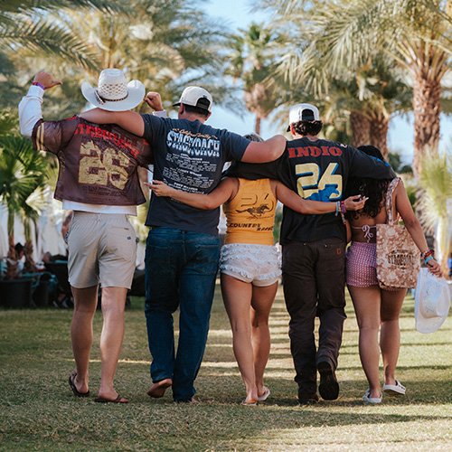 Stagecoach fans walking arms around each other
