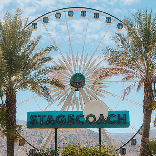 ferris wheel behind Stagecoach sign