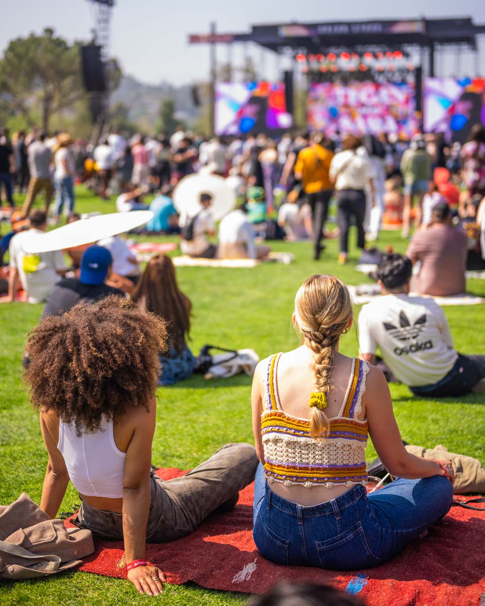 People Sitting on Blanket