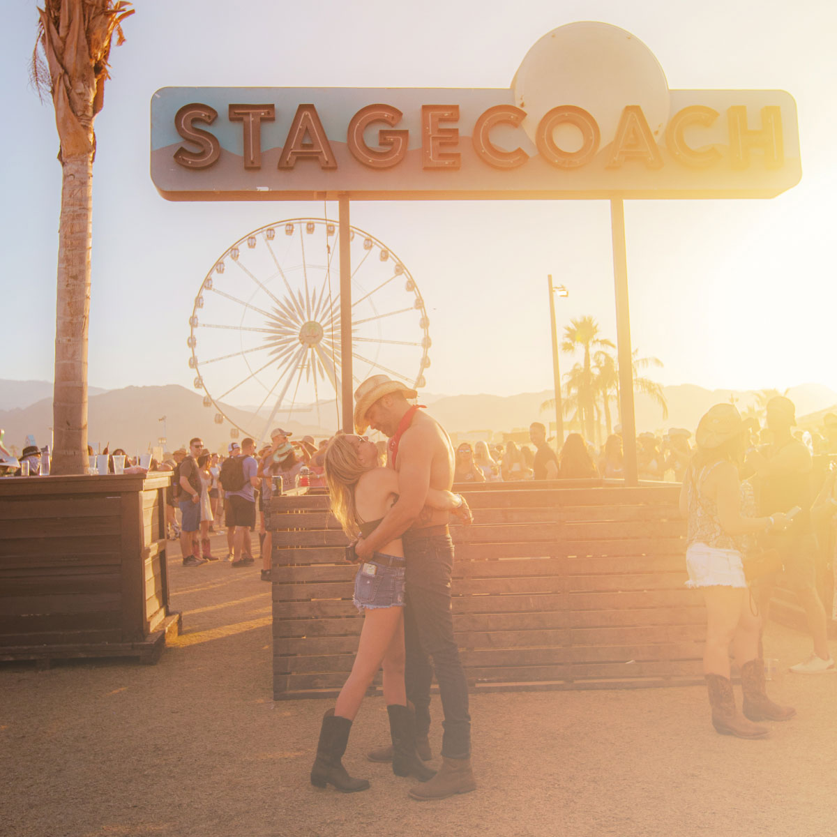 Couple in front of Stagecoach sign