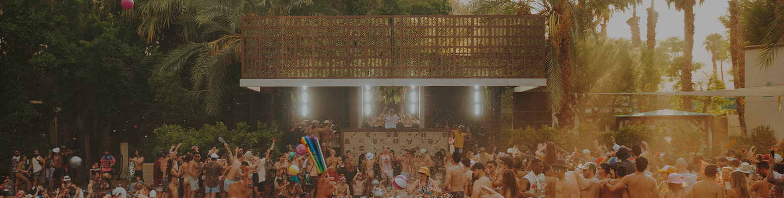 Splash House fans in front of dj booth at pool