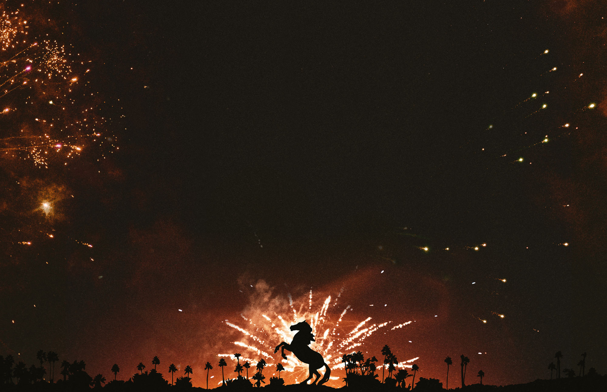 Horse statue with fireworks