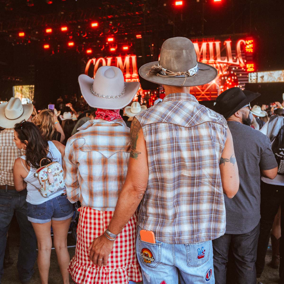 Couple dressed in plaid and hats