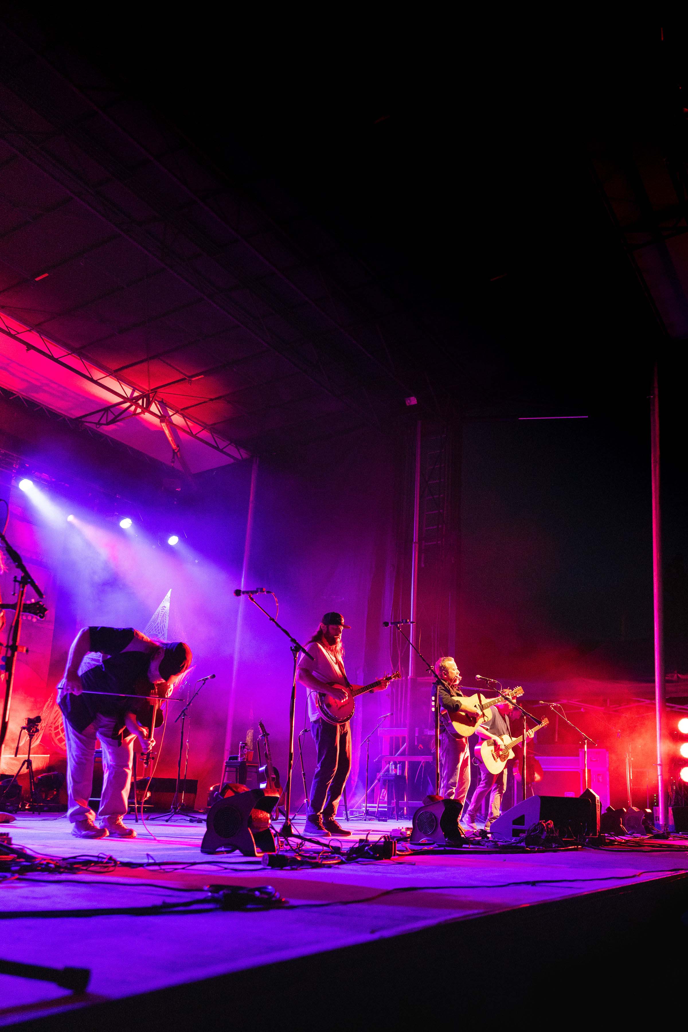 Band playing on stage at night