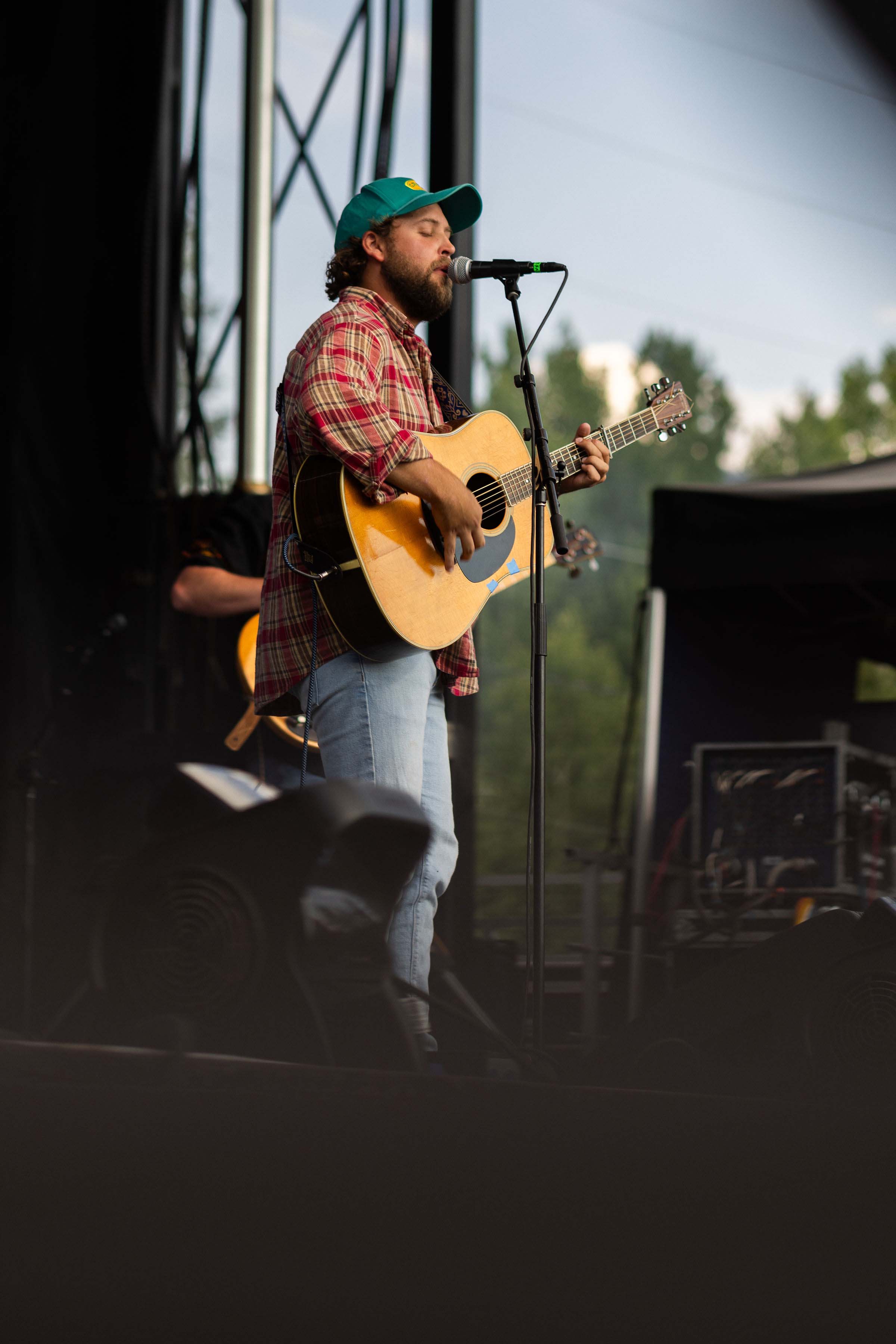 Artist on stage with guitar