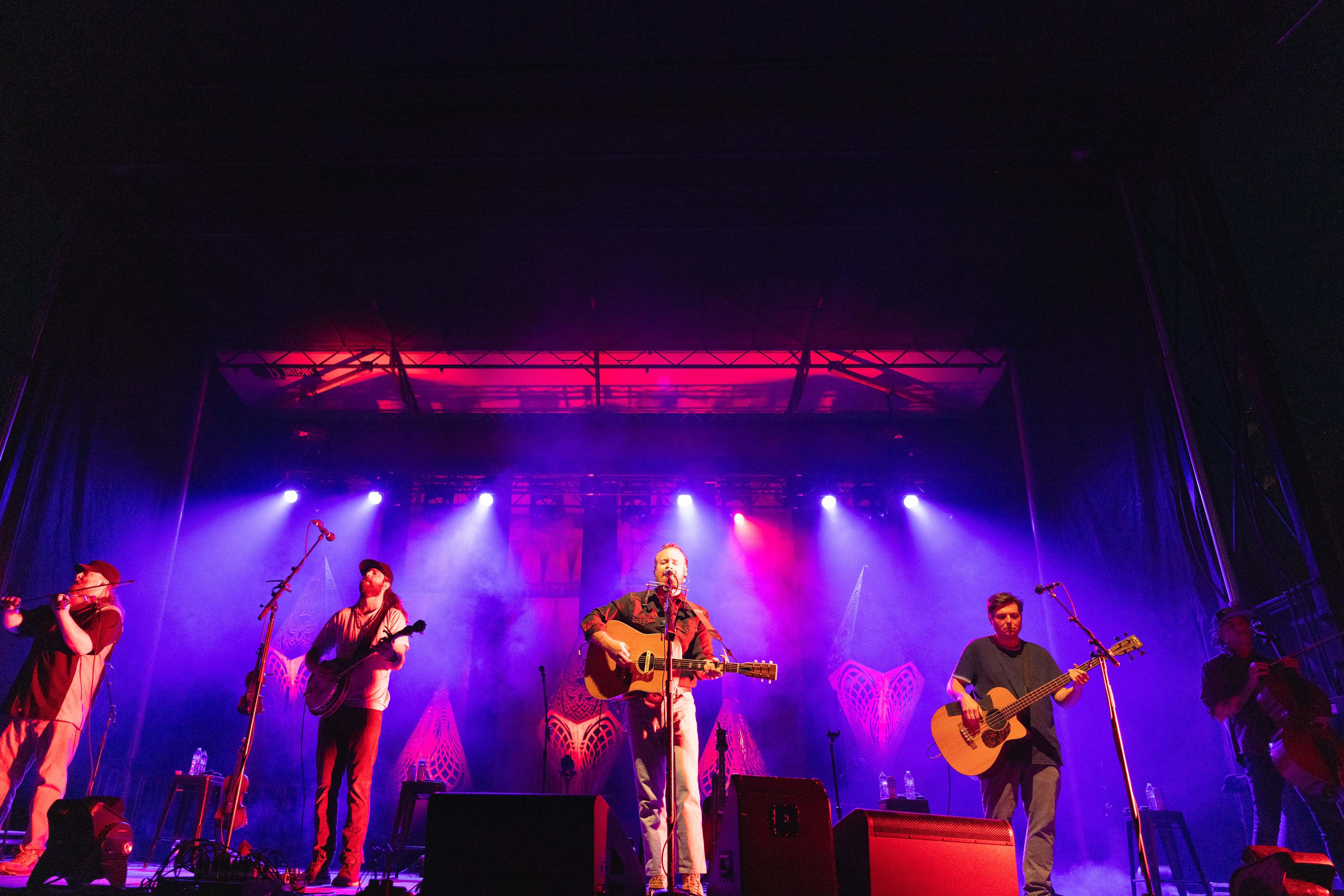 Band playing on stage at night