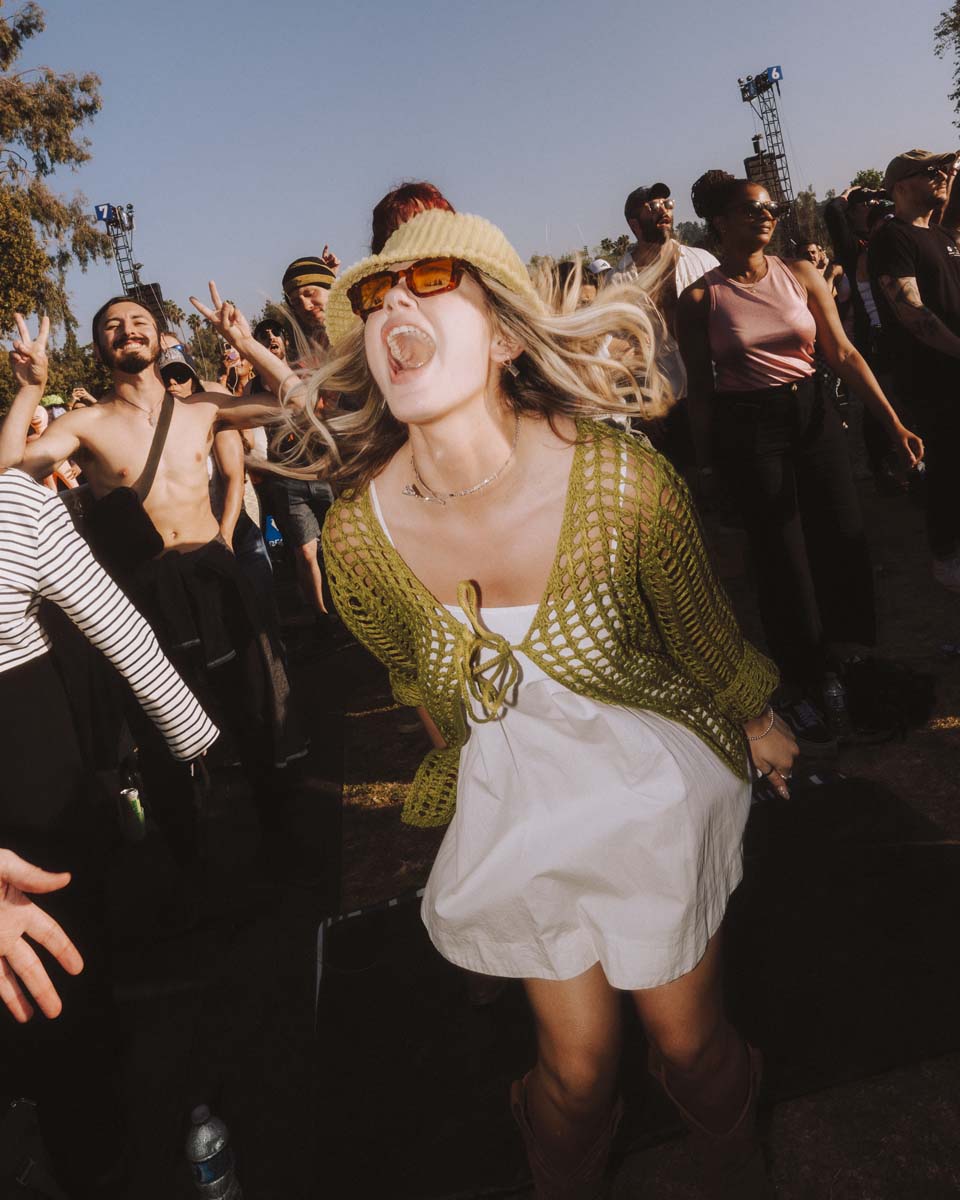 Person in Crowd Singing