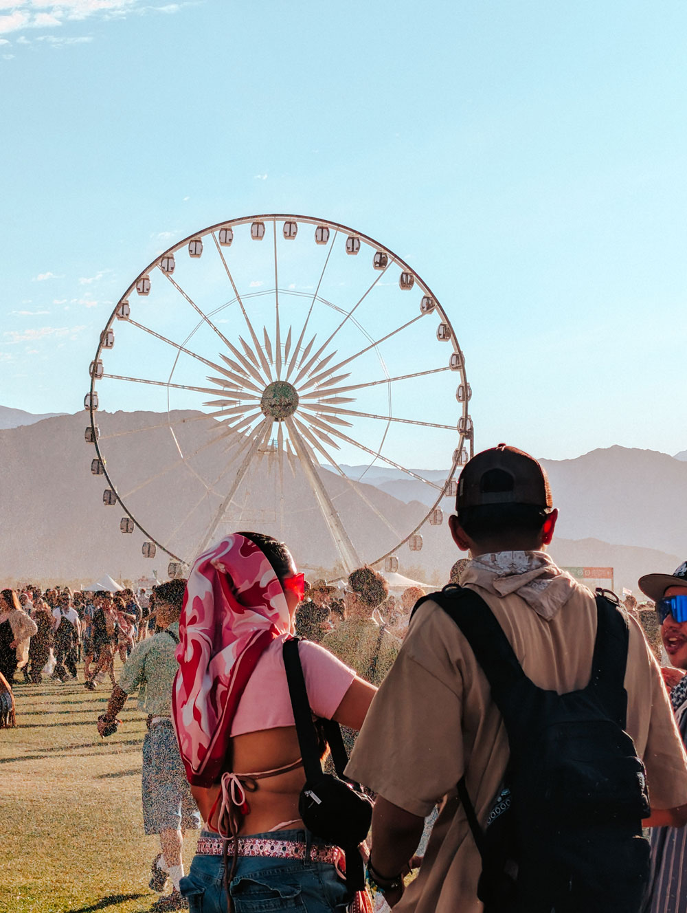 fans in front of Coachella ferris wheel
