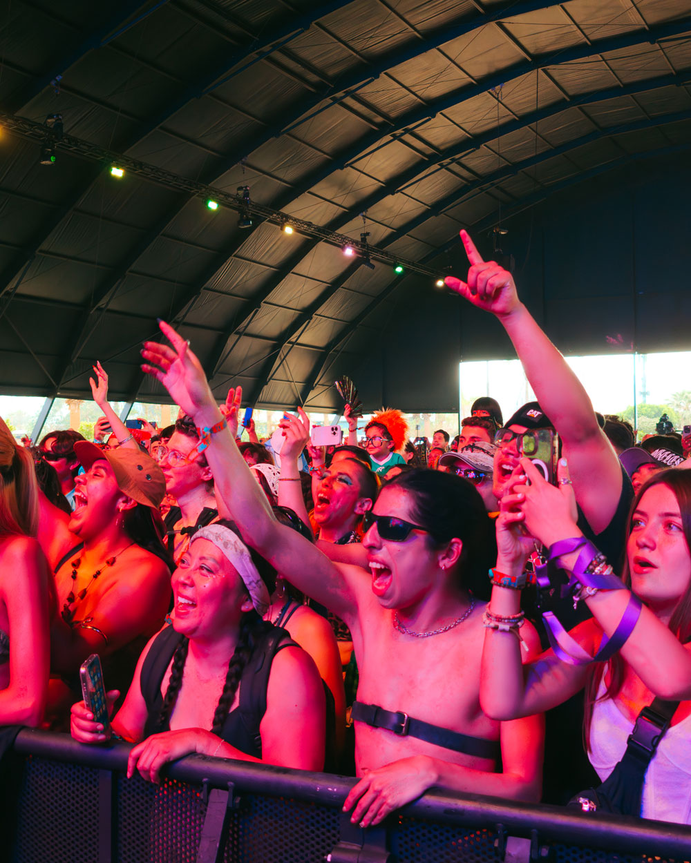 first row of fans watching performance in Sahara tent