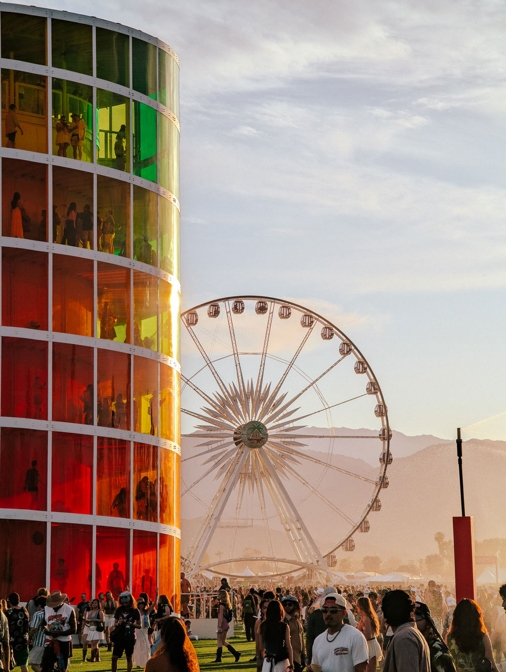 Coachella tower and ferris wheel at dusk