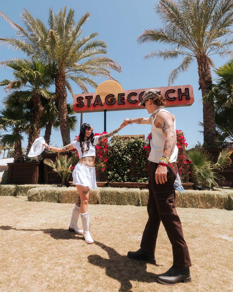 couple at the stagecoach sign