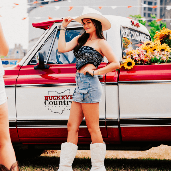 Girl in front of truck