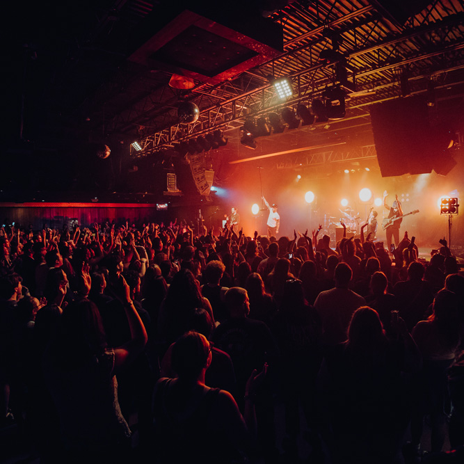 Band on stage and crowded floor at Starland Ballroom